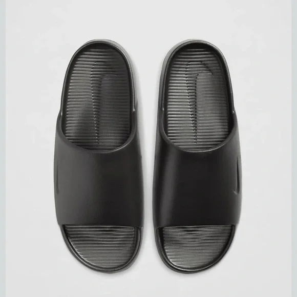 Nike Unisex Women size 11/mens size 10. 
Black Slide Sandals - Picture 2 of 3